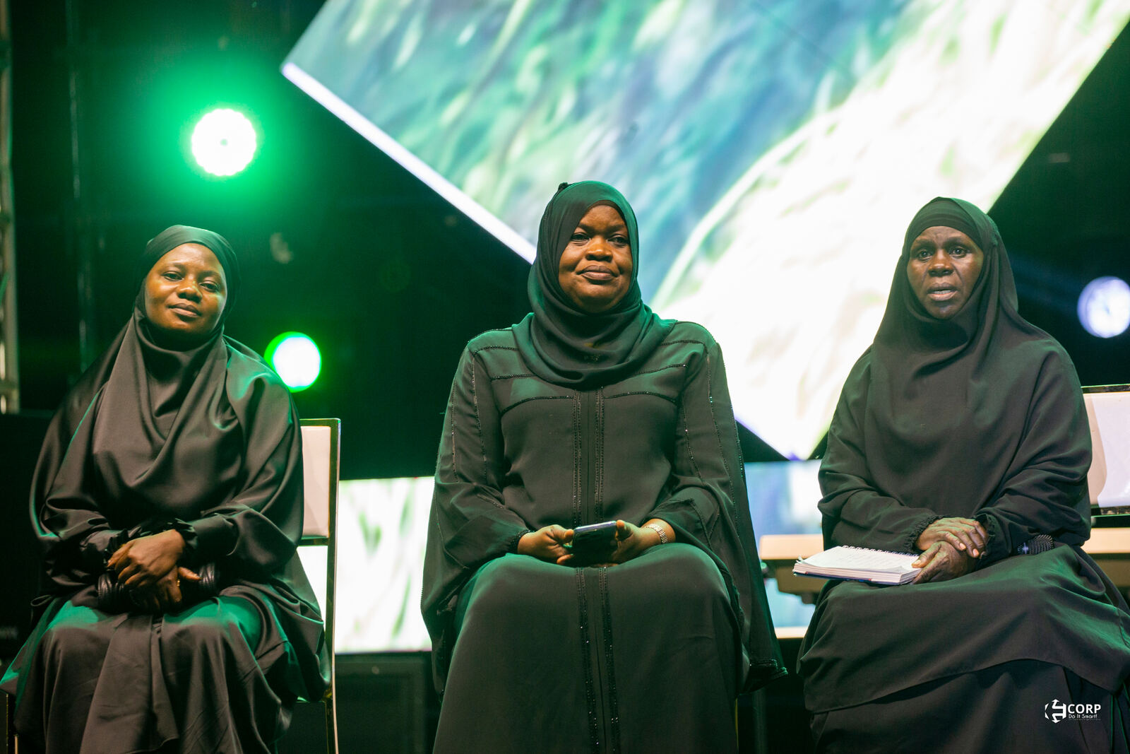 Panel · Three voices, one stage